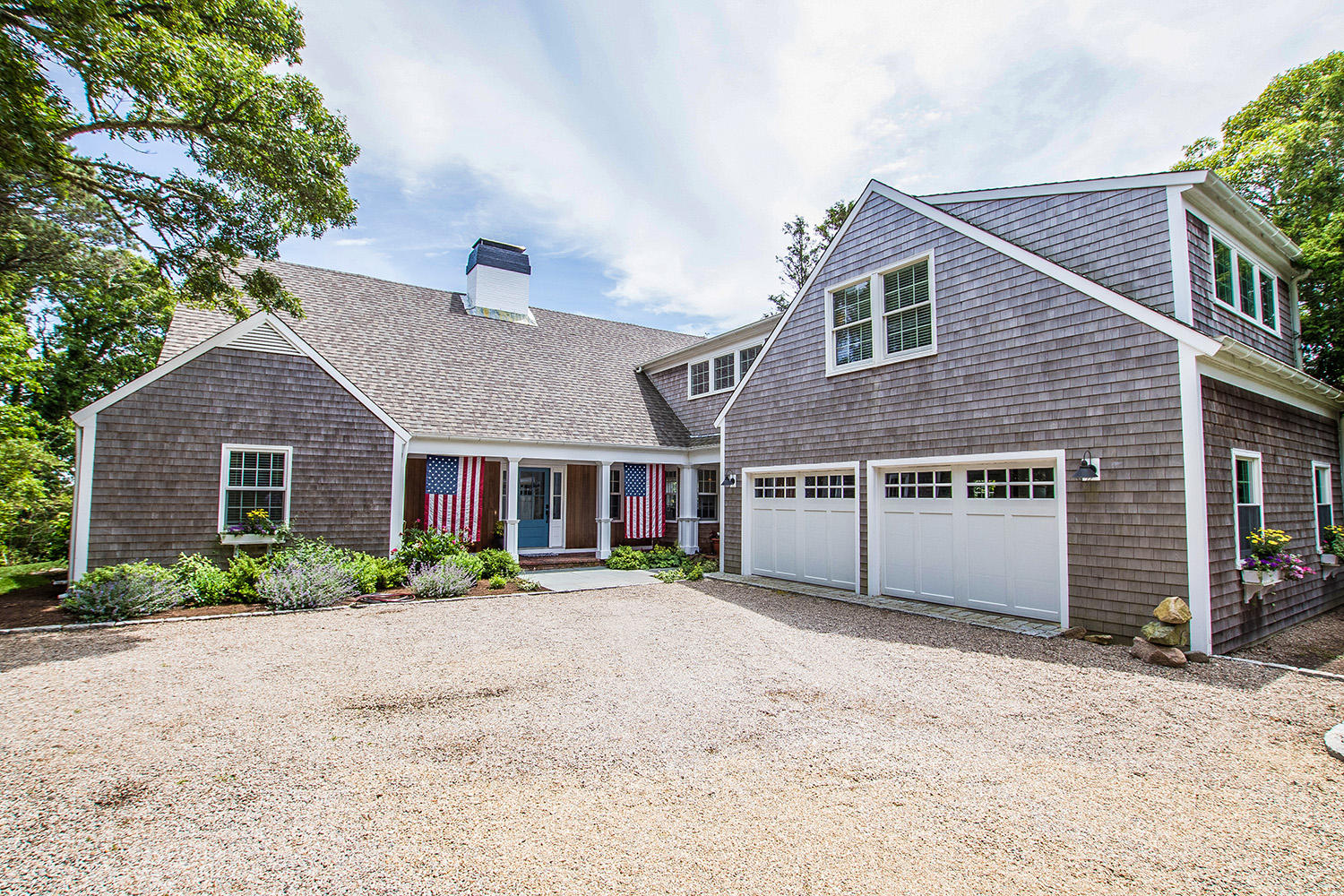 107 Captains Walk Chatham, MA 02650 - Photo 4 of 51 a front view of a house with a yard