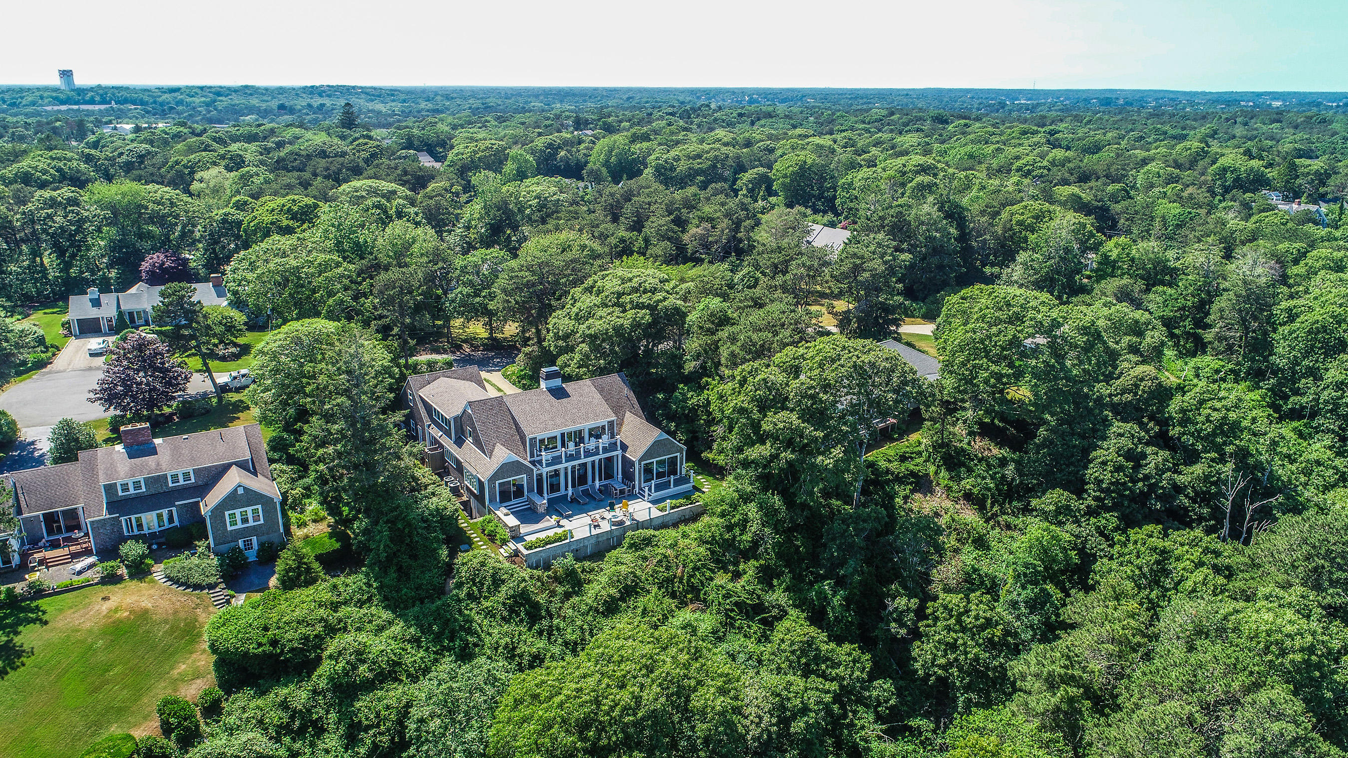 107 Captains Walk Chatham, MA 02650 - Photo 46 of 51 an aerial view of a house with a yard