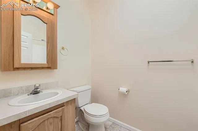a view of cabinets and wooden floor
