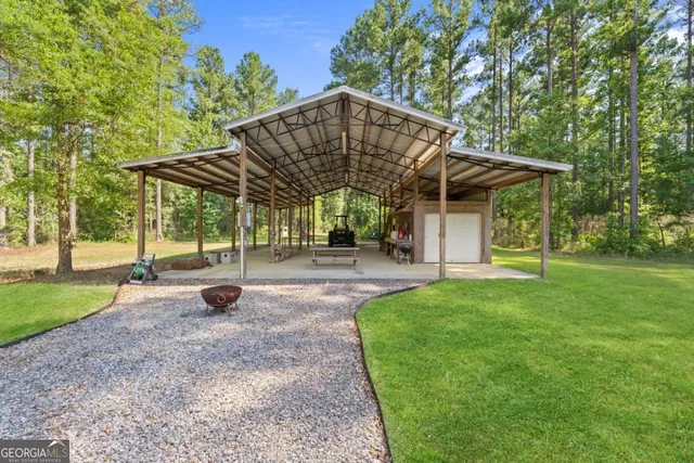 a view of a big yard next to a yard