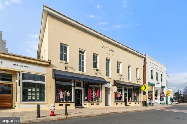 a view of a food mall next to a building