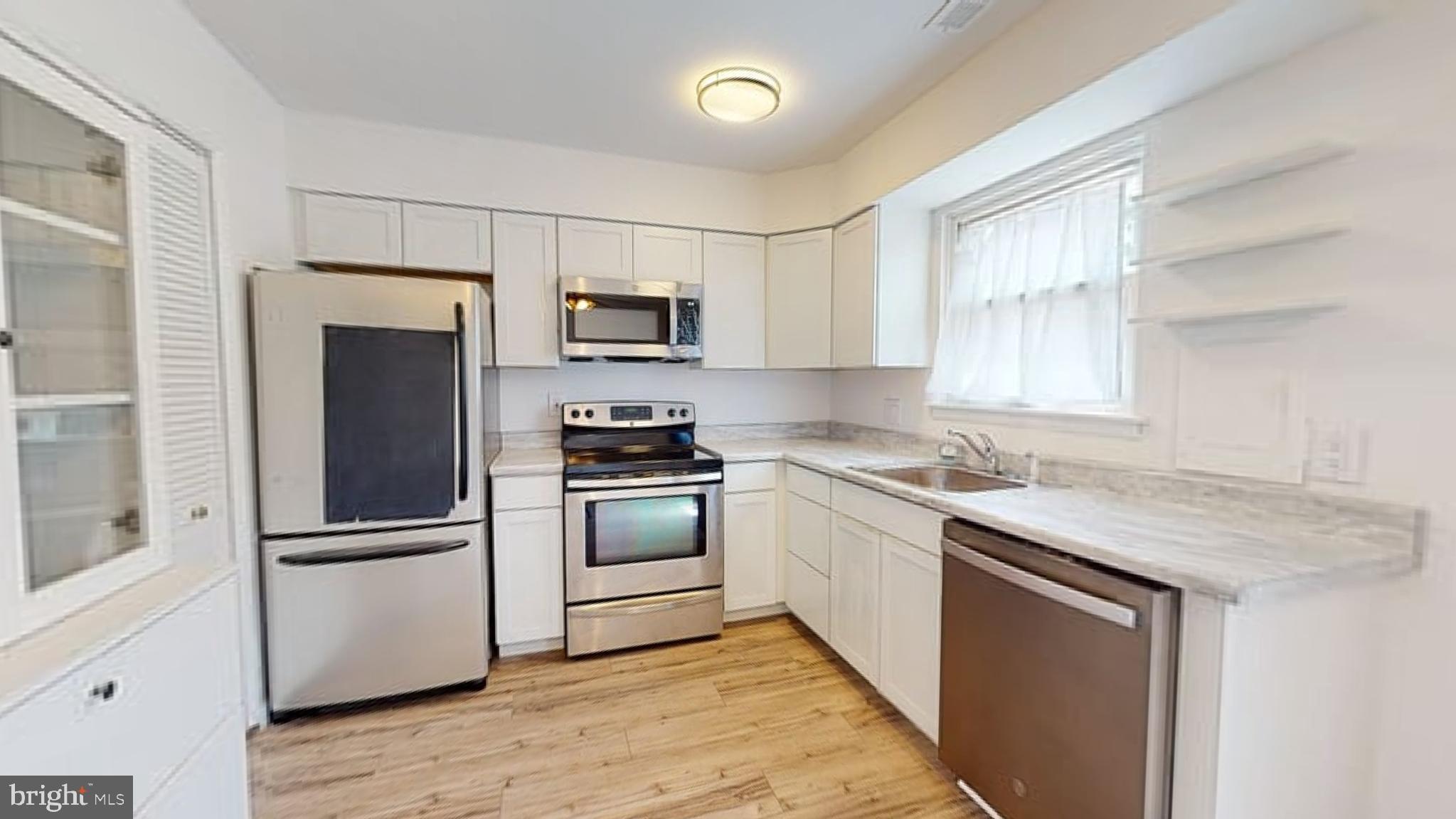 49 Eaves Mill Road Medford, NJ 08055 - Photo 1 of 38 a kitchen with kitchen island granite countertop appliances cabinets and a sink