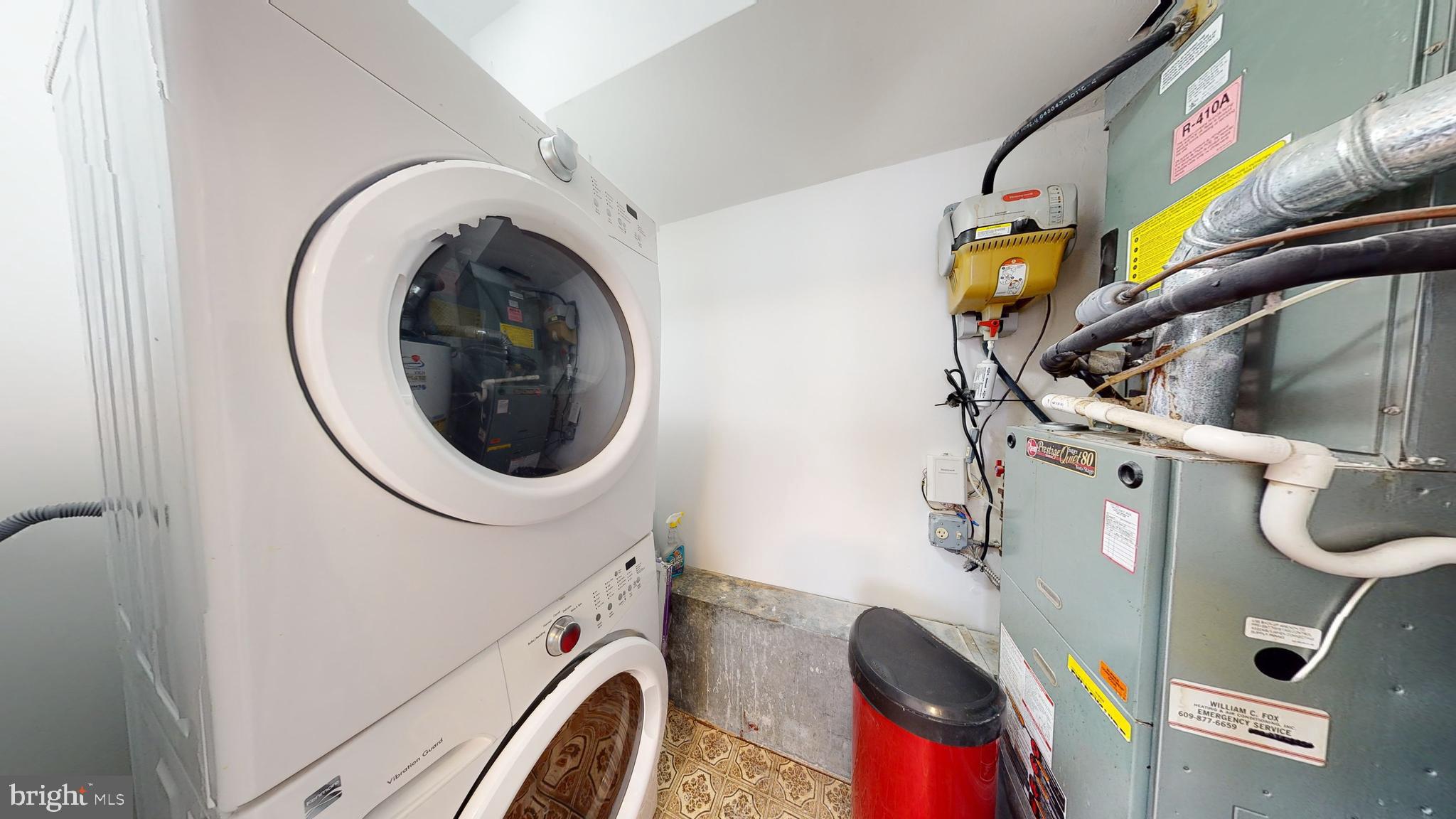 49 Eaves Mill Road Medford, NJ 08055 - Photo 23 of 38 a utility room with dryer and washer
