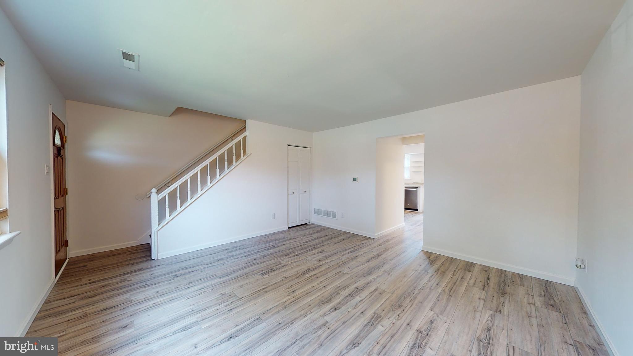 49 Eaves Mill Road Medford, NJ 08055 - Photo 10 of 38 a view of an empty room with wooden floor