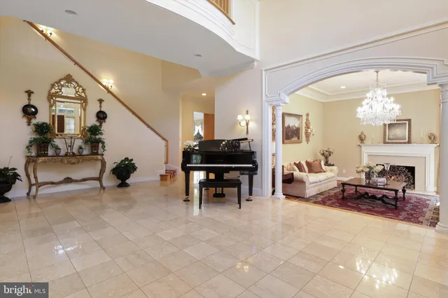 a living room with fireplace furniture and a flat screen tv