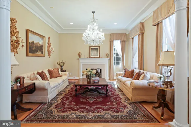 a large kitchen with stainless steel appliances granite countertop a stove a sink and a refrigerator