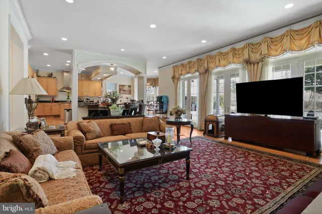 a bedroom with a bed gym equipment and mirror