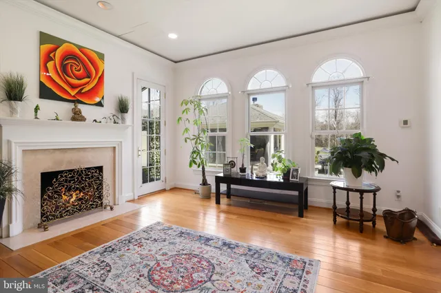 a living room with furniture and flat screen tv