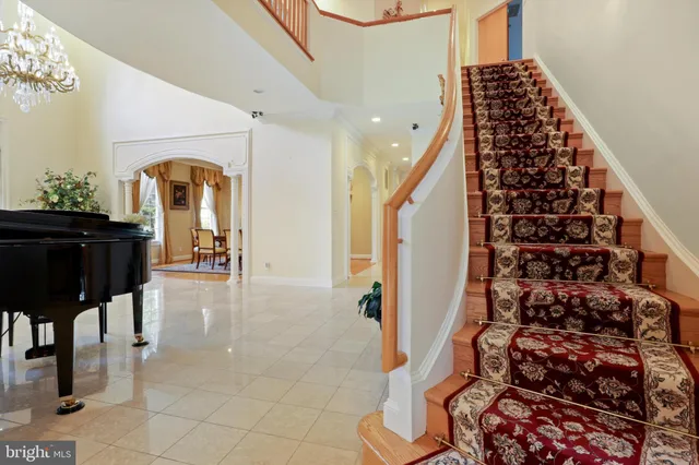 a living room with furniture fireplace and a flat screen tv