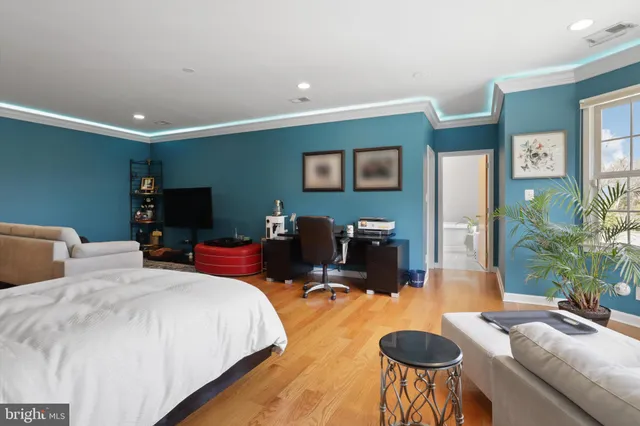 a sign that is sitting on a wooden floor