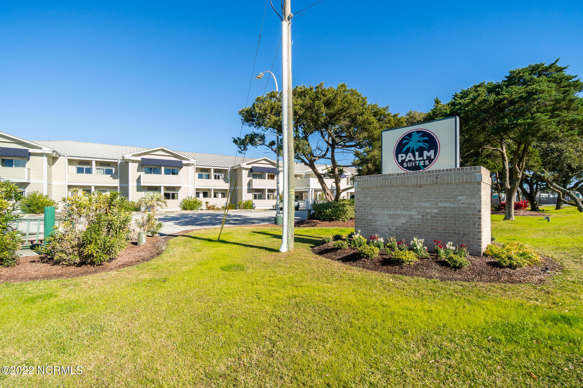 602 West Fort Macon Road, Unit 101 Atlantic Beach, NC 28512 - Photo 1 of 23 palm-suites-101-19
