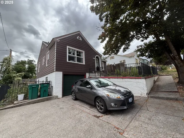 a car parked in front of a house