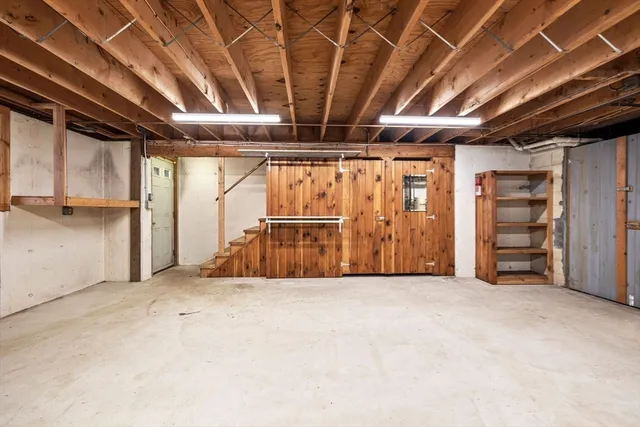 a view of an empty room with stairs