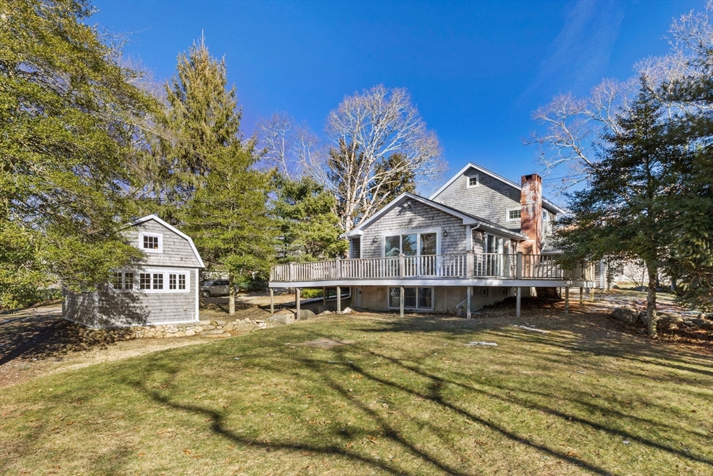 66 Converse Road Marion, MA 02738 - Photo 21 of 22 a front view of a house with a porch