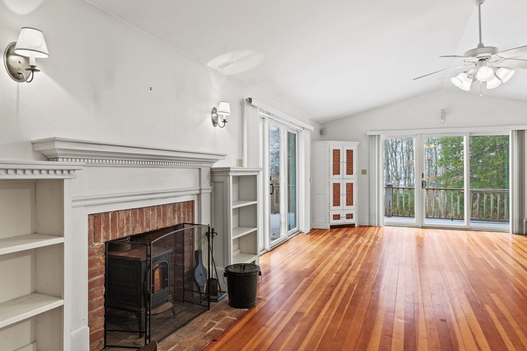 66 Converse Road Marion, MA 02738 - Photo 4 of 22 a living room with furniture and a fireplace