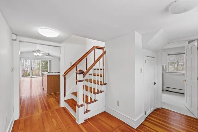 a view of entryway with wooden floor
