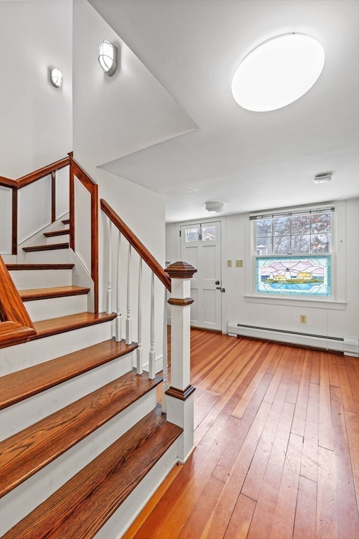 66 Converse Road Marion, MA 02738 - Photo 8 of 22 a view of entryway with wooden floor