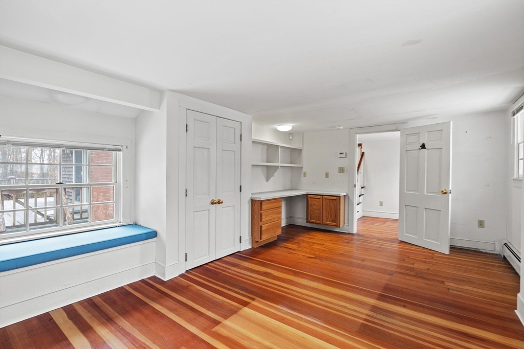 66 Converse Road Marion, MA 02738 - Photo 9 of 22 a bedroom with a bed and a window