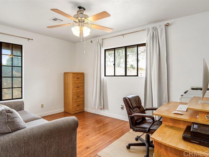 13913 Via De Jamul Jamul Ca Jamul, CA 91935 - Photo 29 of 67 a livingroom with workspace and a window