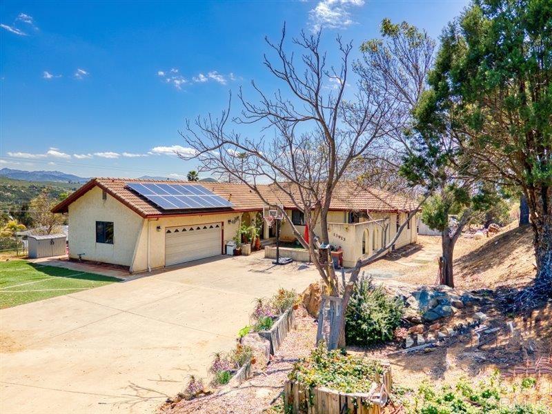 13913 Via De Jamul Jamul Ca Jamul, CA 91935 - Photo 3 of 67 a yellow house with trees in front of it