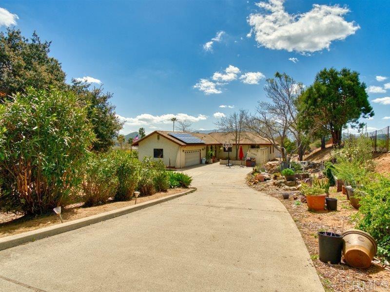 13913 Via De Jamul Jamul Ca Jamul, CA 91935 - Photo 38 of 67 a view of a house with a snow in the yard