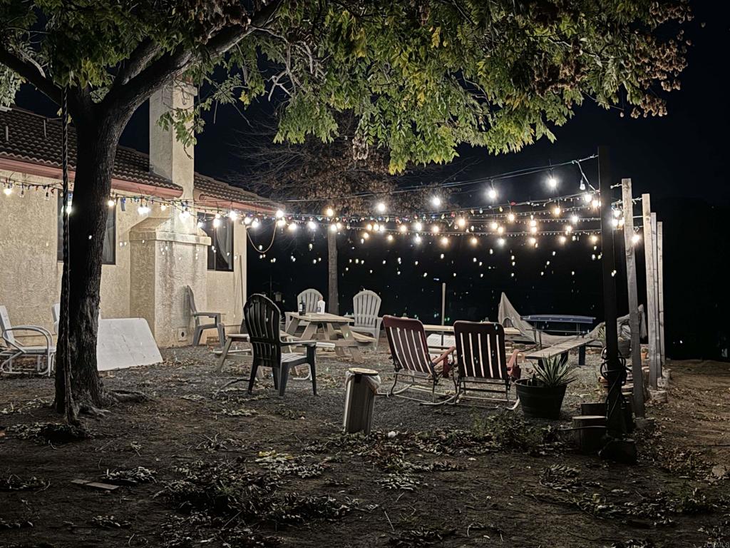 13913 Via De Jamul Jamul Ca Jamul, CA 91935 - Photo 65 of 67 a outdoor living space with patio furniture and a fountain