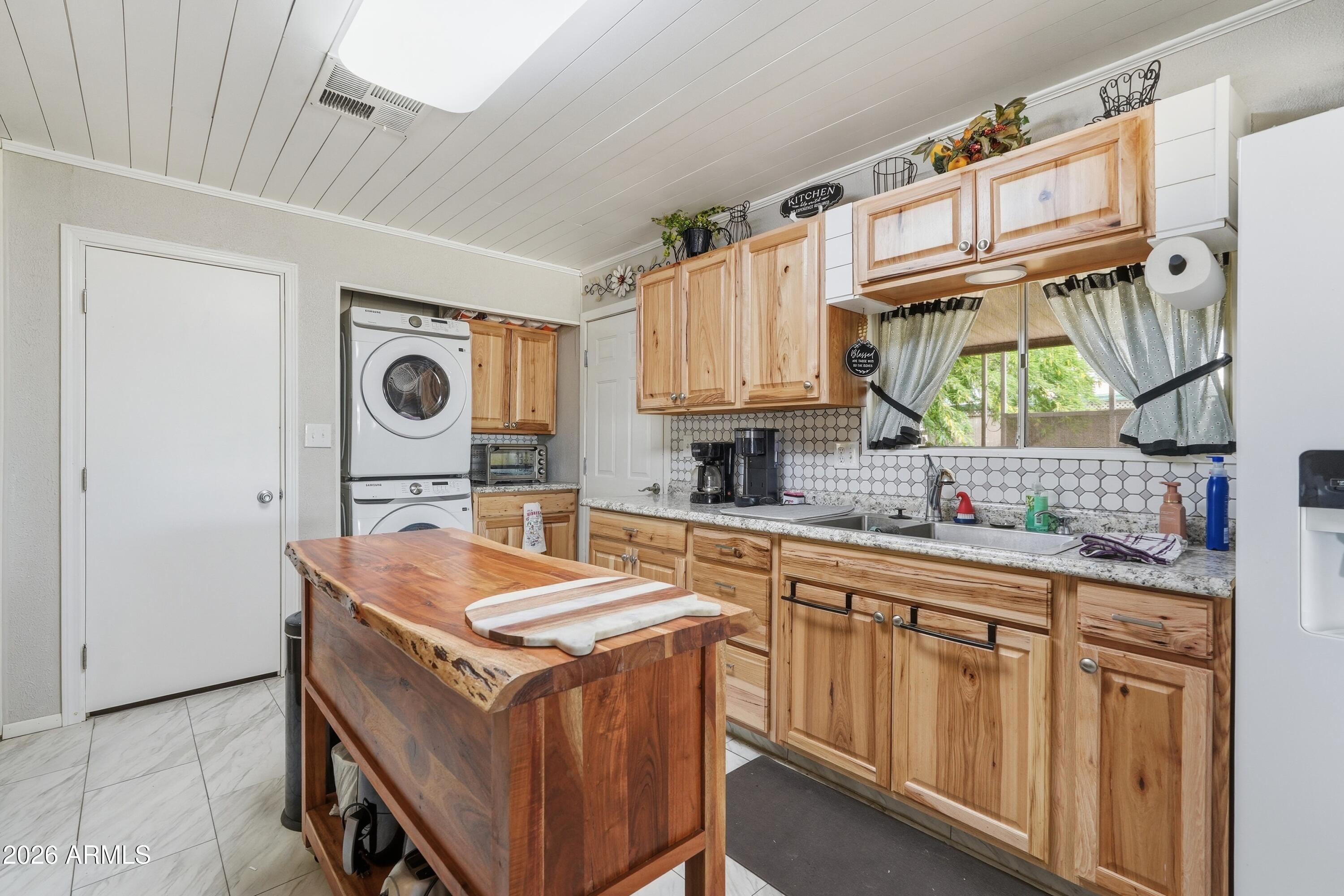 11100 West Alsdorf Road, Unit 50 Arizona City, AZ 85123 - Photo 9 of 36 a kitchen that has a cabinets and a stove