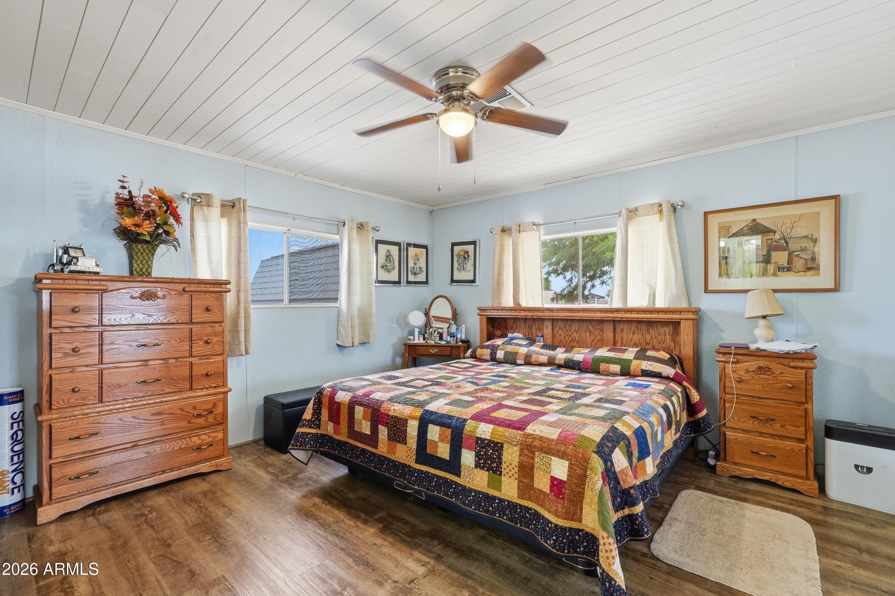 11100 West Alsdorf Road, Unit 50 Arizona City, AZ 85123 - Photo 17 of 36 a bedroom with a bed and dresser