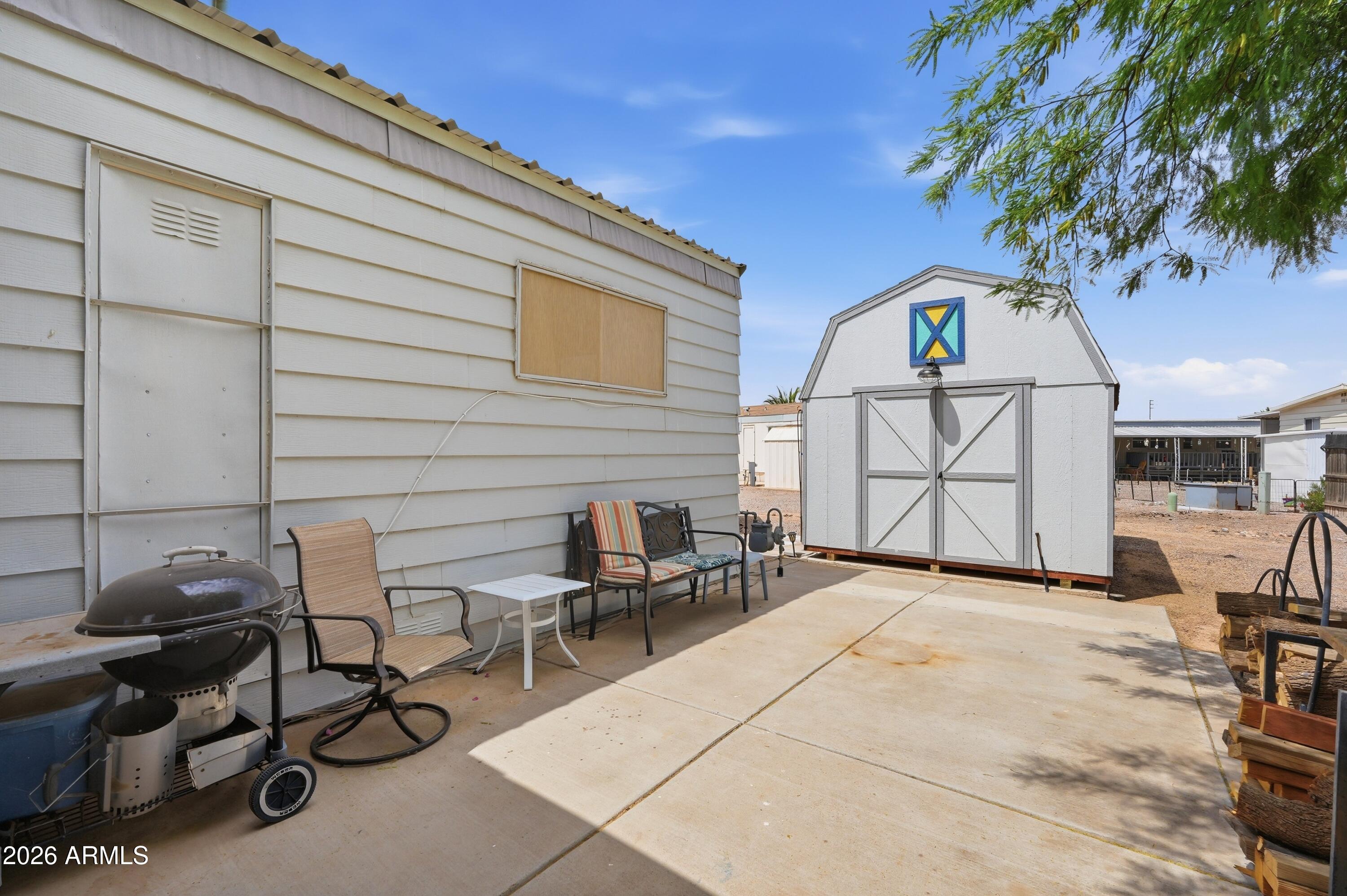 11100 West Alsdorf Road, Unit 50 Arizona City, AZ 85123 - Photo 30 of 36 a view of a chairs and table in a house
