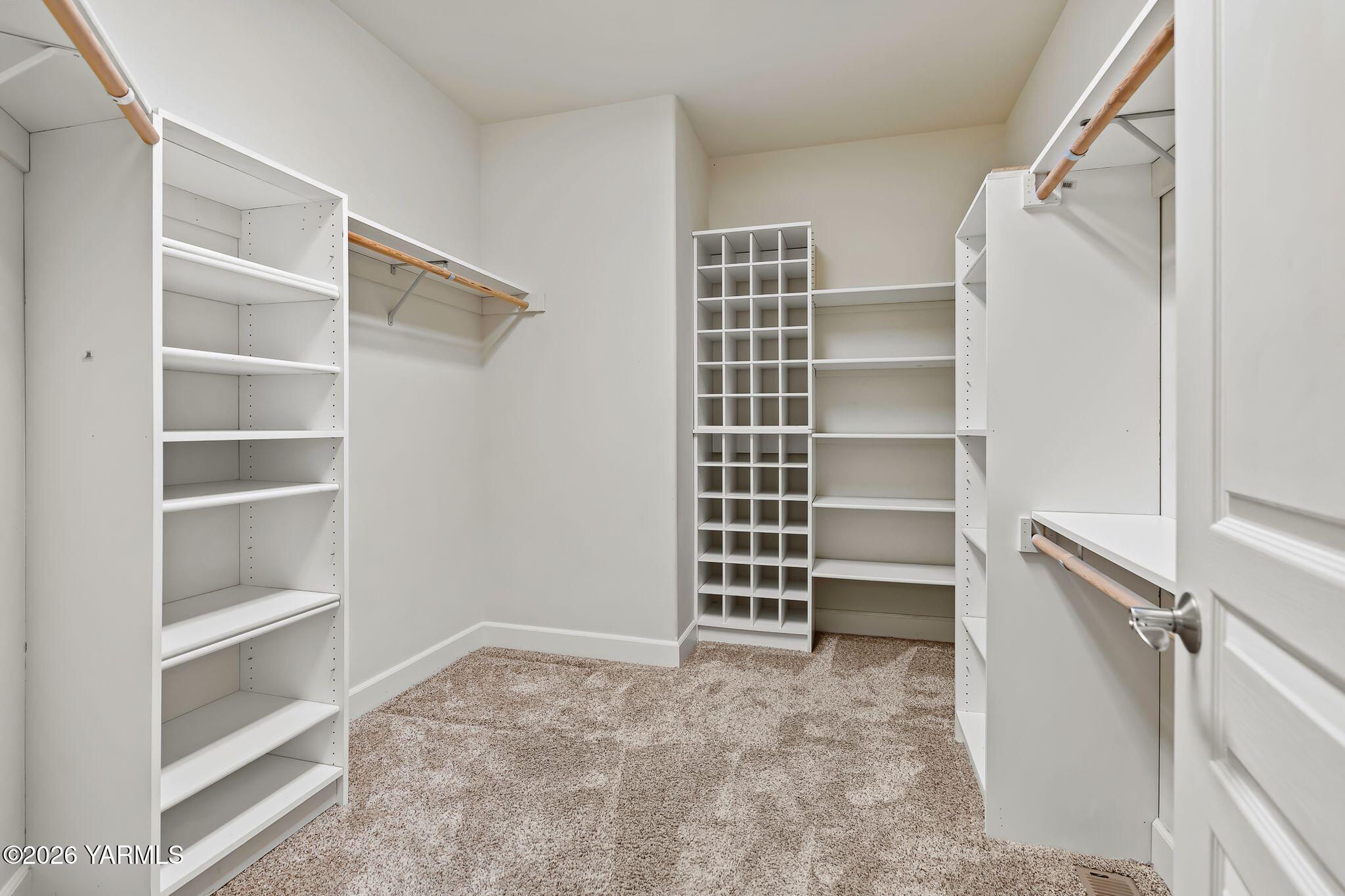 8507 Midvale Road Yakima, WA 98908 - Photo 14 of 24 a view of walk in closet with empty racks