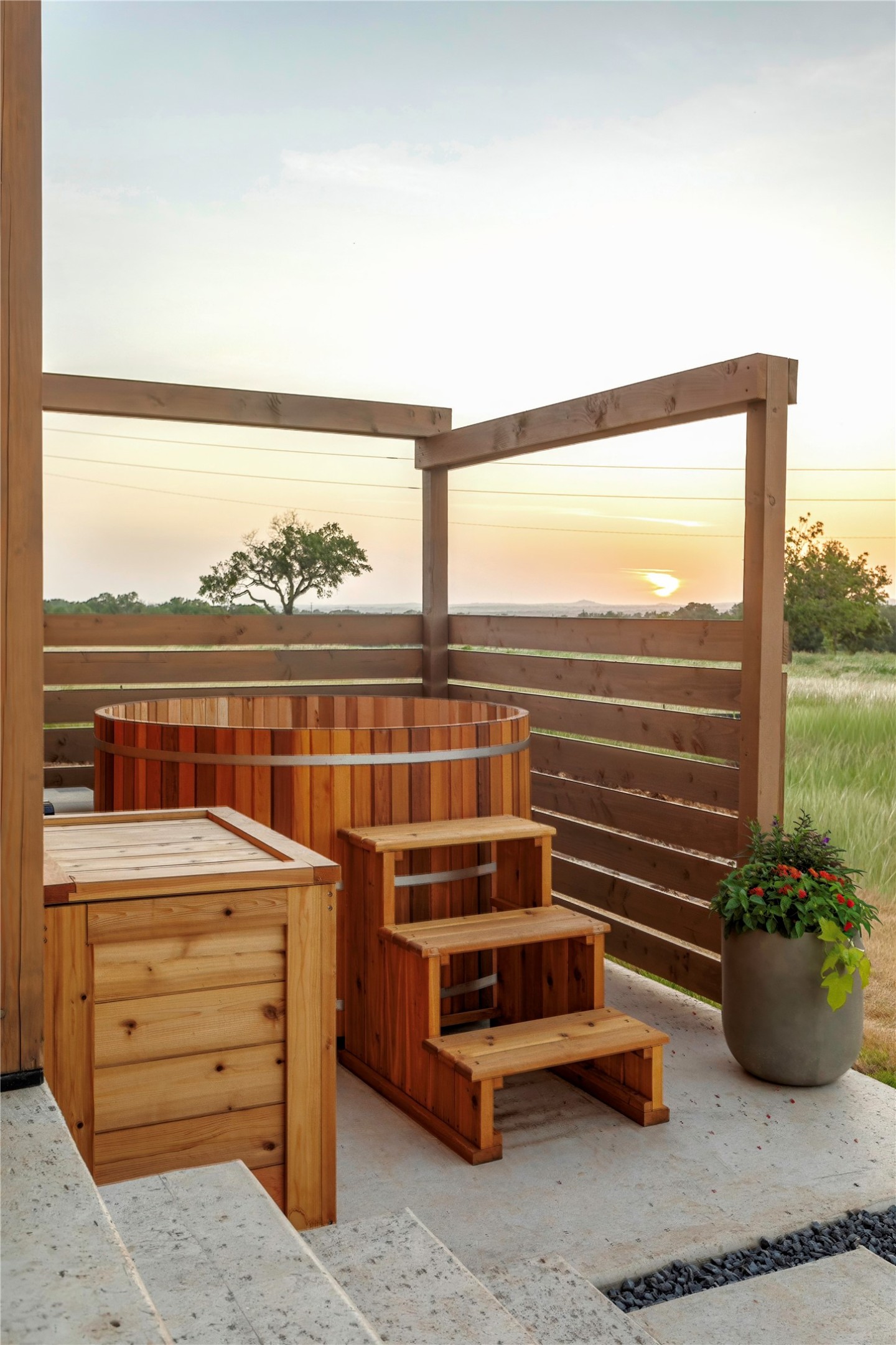 310 Hye Springs Road, Unit 107 Hye, TX 78635 - Photo 18 of 20 Outdoor cedar hot tub perfectly positioned for sunset views and quiet evenings overlooking the Texas Hill Country.
