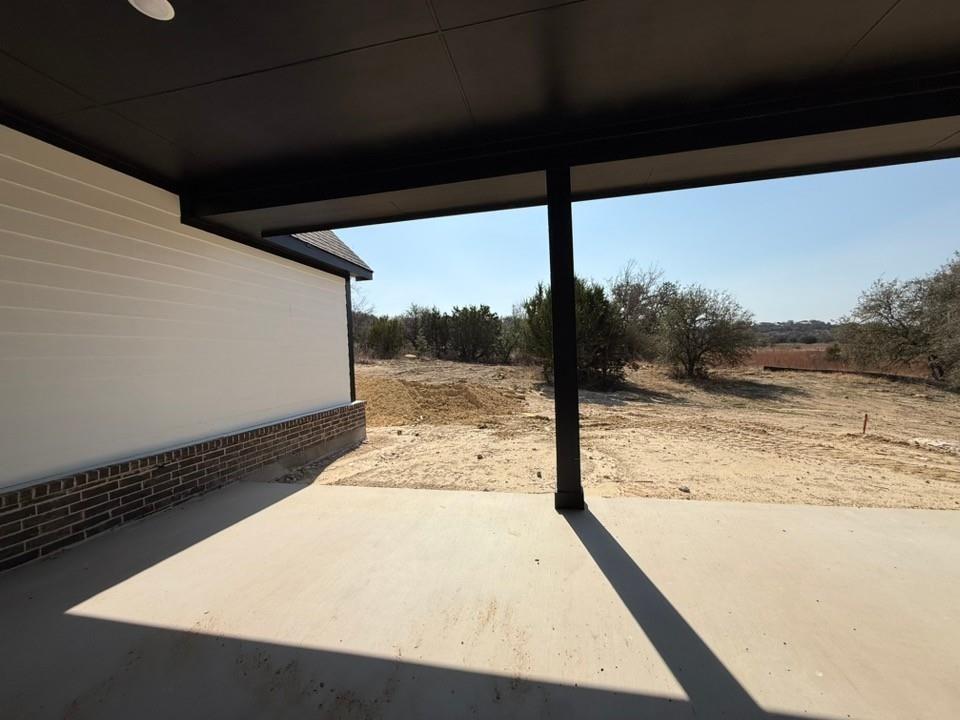 409 Hayden Faith Court Springtown, TX 76082 - Photo 22 of 23 a view of a floor to ceiling window
