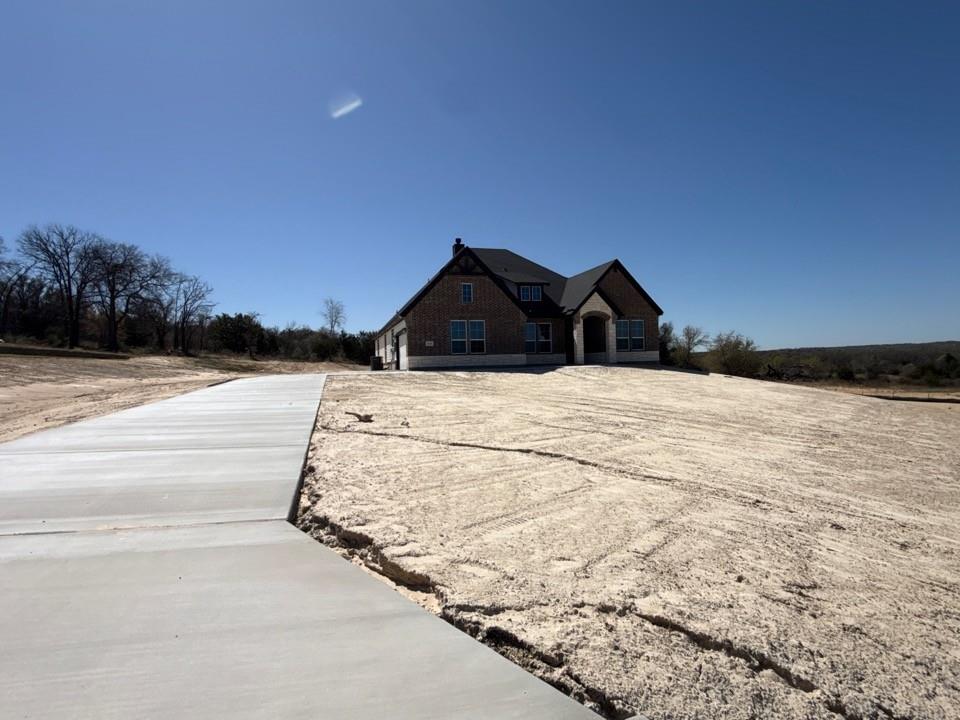 409 Hayden Faith Court Springtown, TX 76082 - Photo 3 of 23 a view of ocean with beach