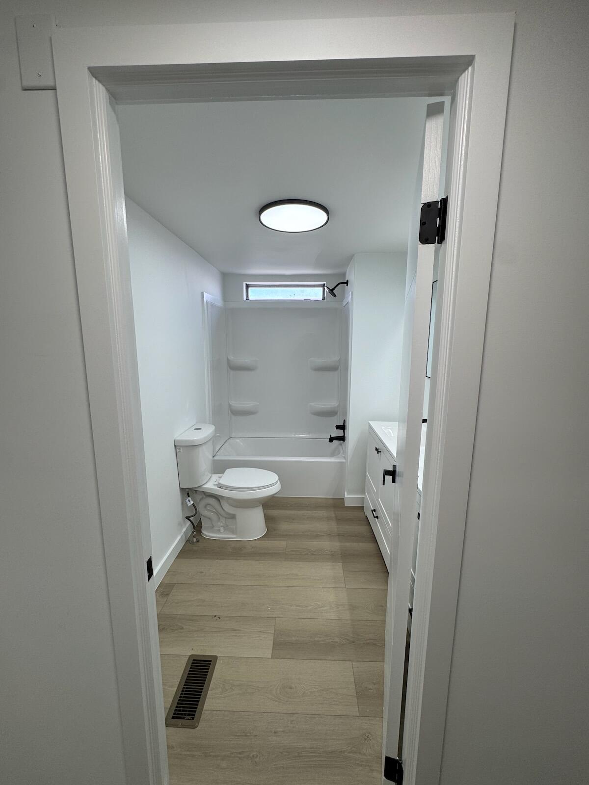 2410 Southwest 50th Street Dania Beach, FL 33312 - Photo 11 of 14 a bathroom with a sink and a mirror