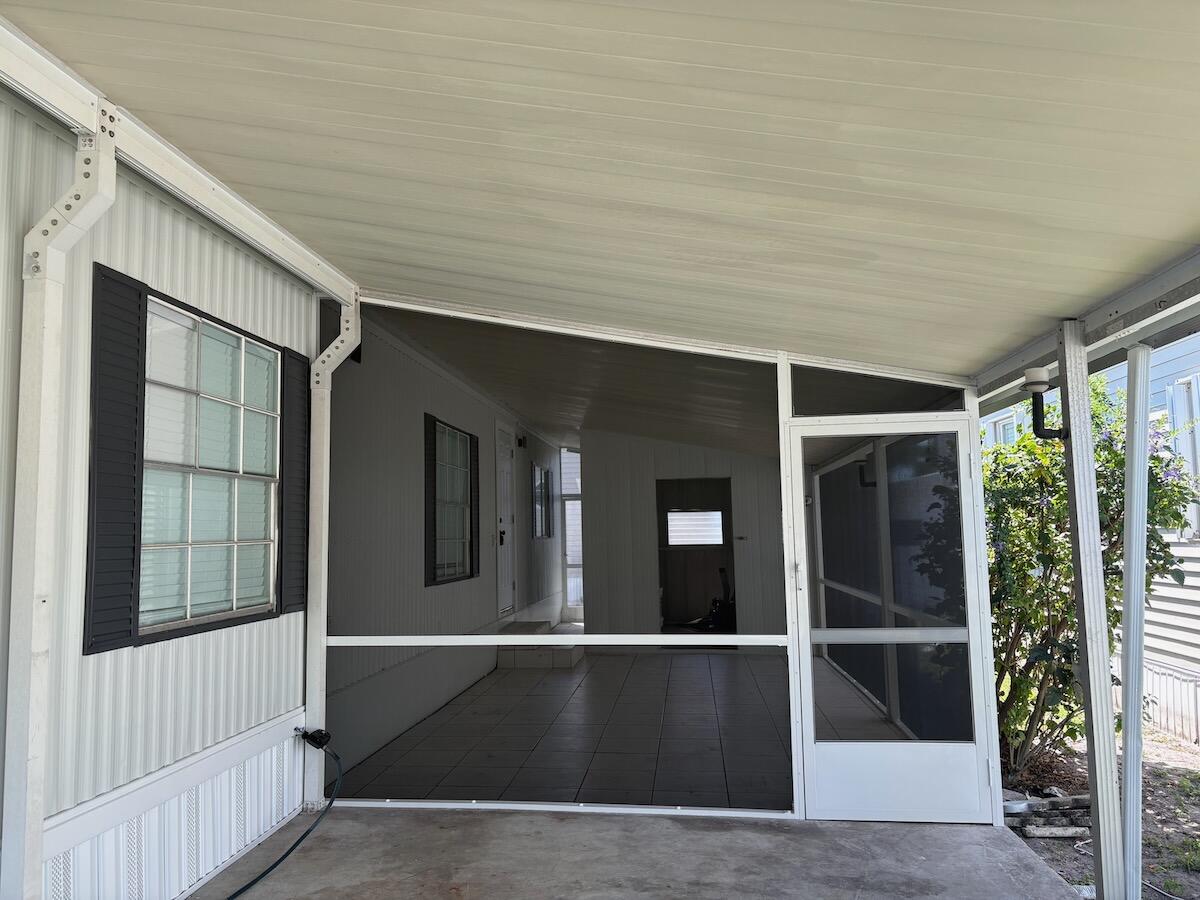 2410 Southwest 50th Street Dania Beach, FL 33312 - Photo 3 of 14 a view of outdoor space deck and kitchen
