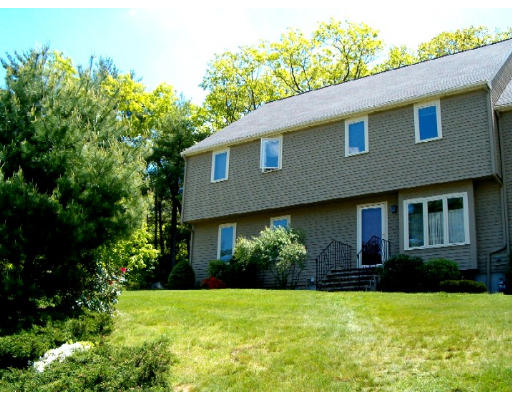 24 Deer Path, Unit 2 Maynard, MA 01754 - Photo 1 of 1 a house that has a tree in front of it