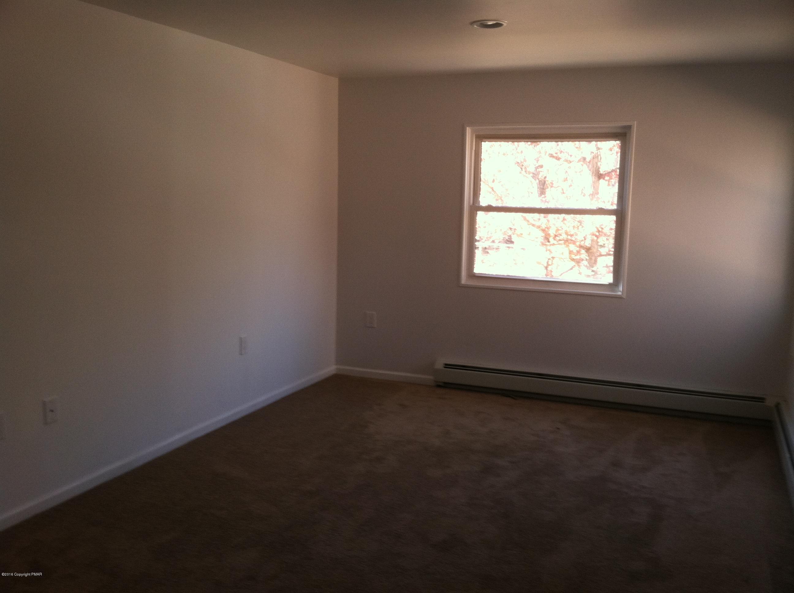 6229 Decker Road Bushkill, PA 18324 - Photo 15 of 15 an empty room with a window
