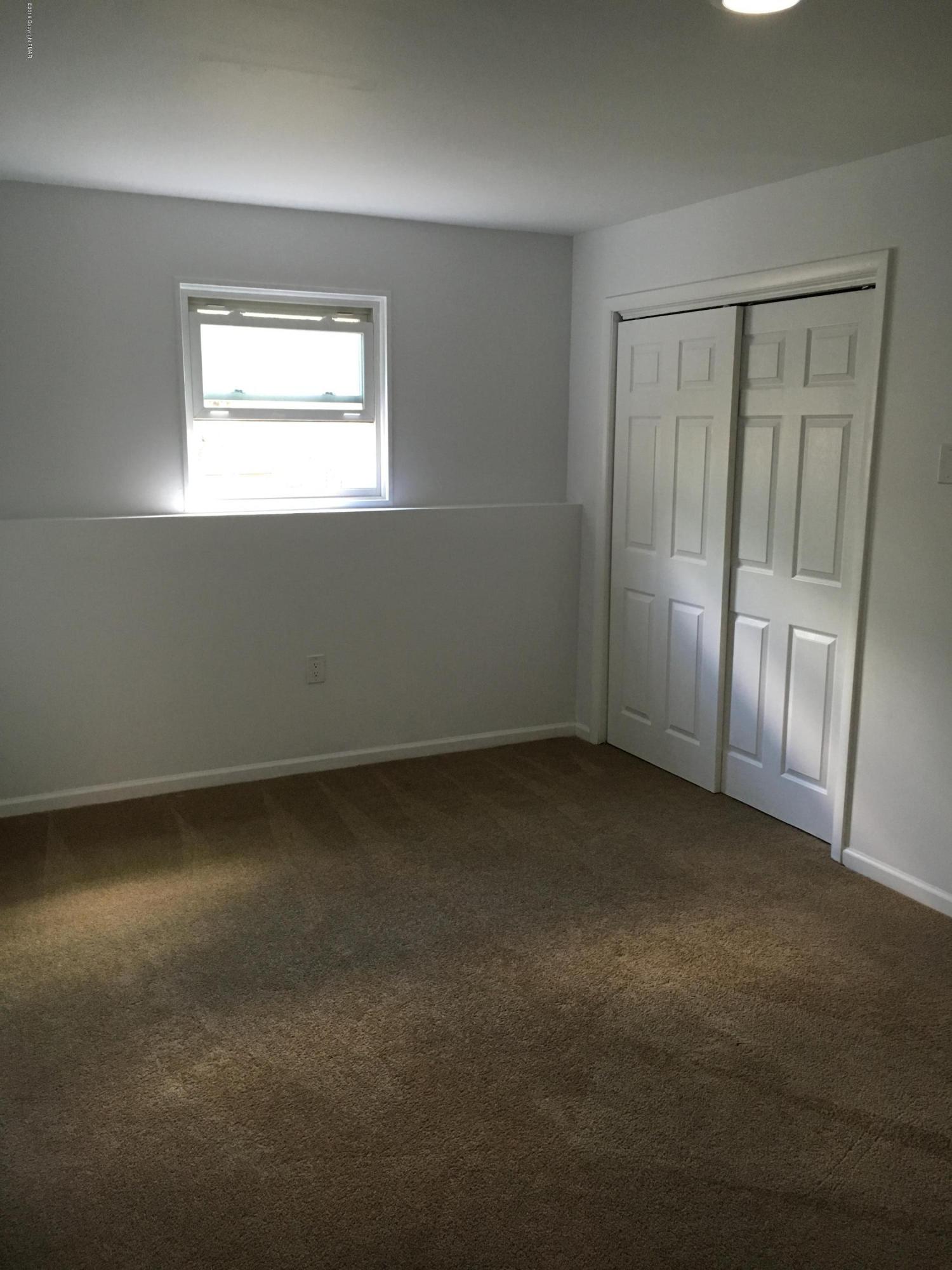 6229 Decker Road Bushkill, PA 18324 - Photo 9 of 15 an empty room with windows