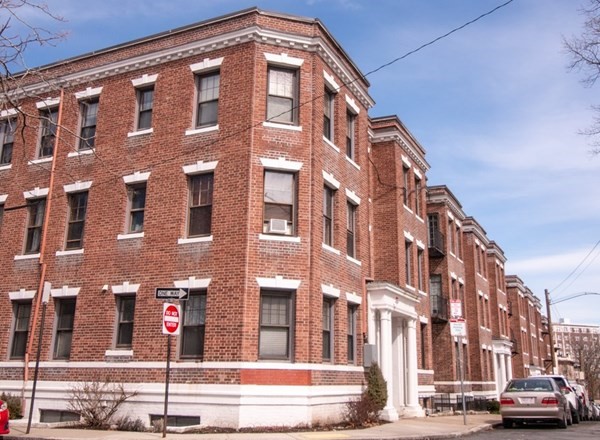 116 Sutherland Road, Unit 11 Boston, MA 02135 - Photo 1 of 6 a front view of a building