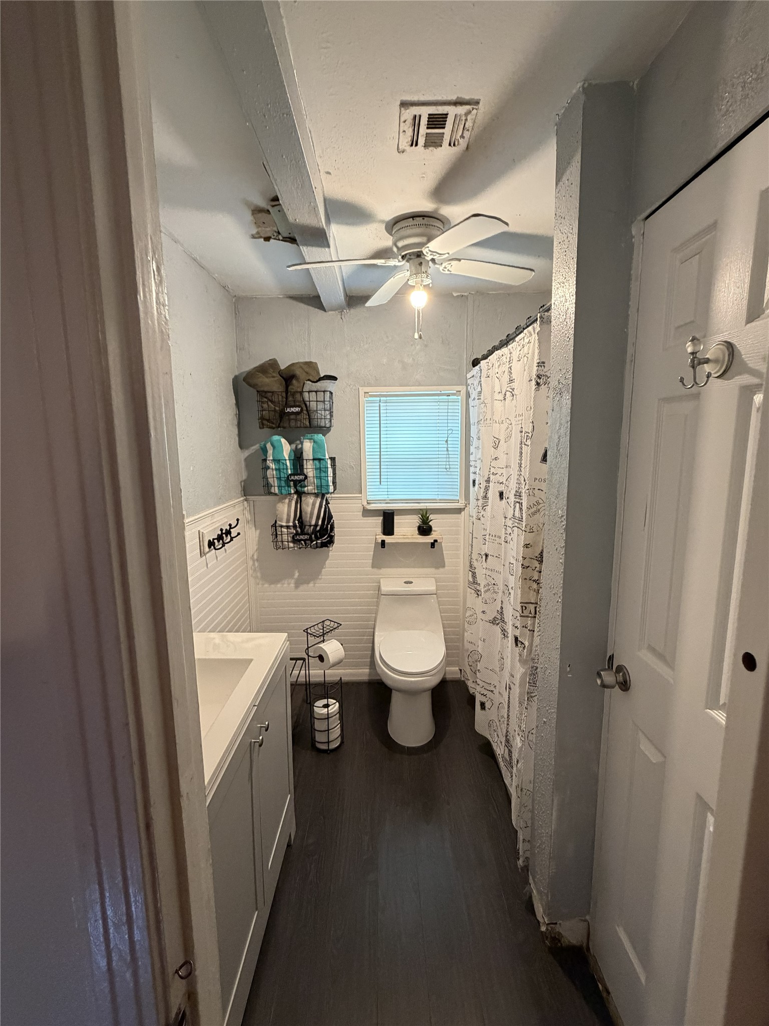 4710 9th Street Bacliff, TX 77518 - Photo 10 of 11 a bathroom with a sink a toilet and shower