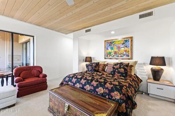 a bathroom with a tub and a sink