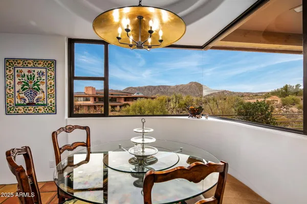 a kitchen with sink cabinets and outdoor view