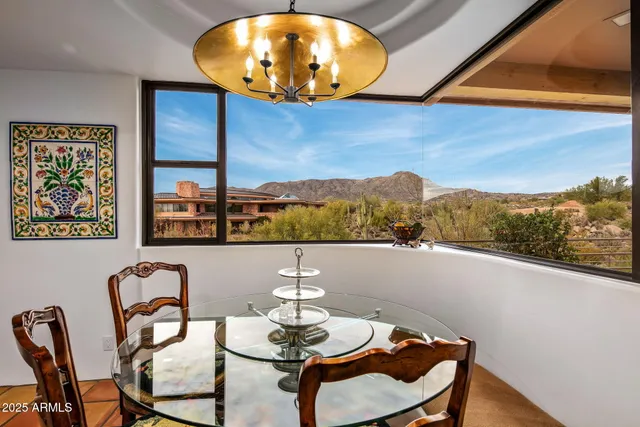 a kitchen with sink cabinets and outdoor view