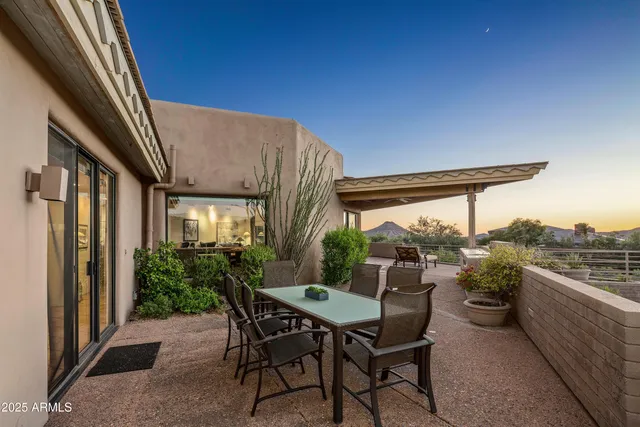 a view of a wooden door of the house