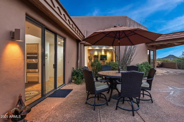 a view of balcony with furniture