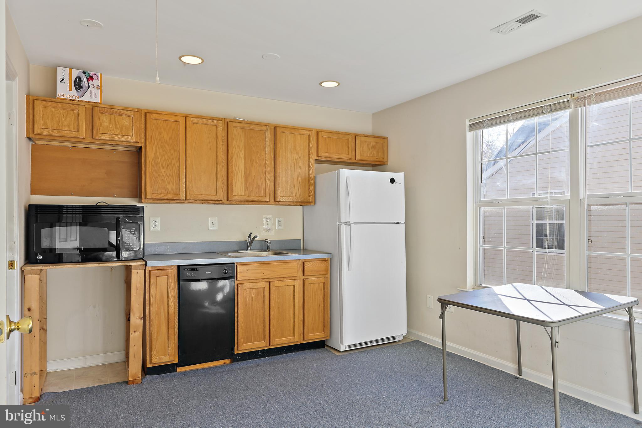8680 Ridge Road Ellicott City, MD 21043 - Photo 16 of 43 Upper Level Kitchenette & Laundry