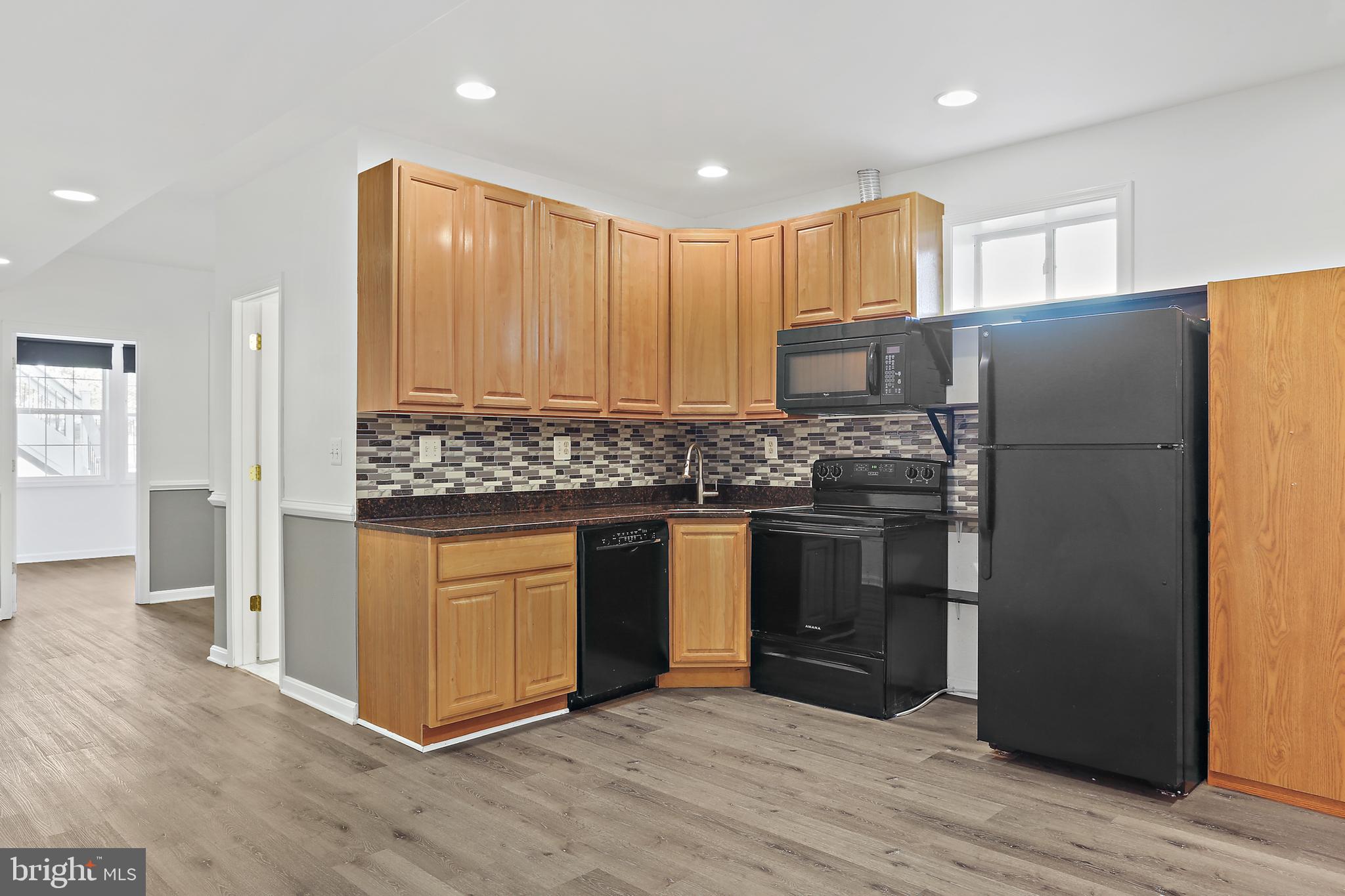 8680 Ridge Road Ellicott City, MD 21043 - Photo 25 of 43 Lower Level Kitchen with graniite counters
