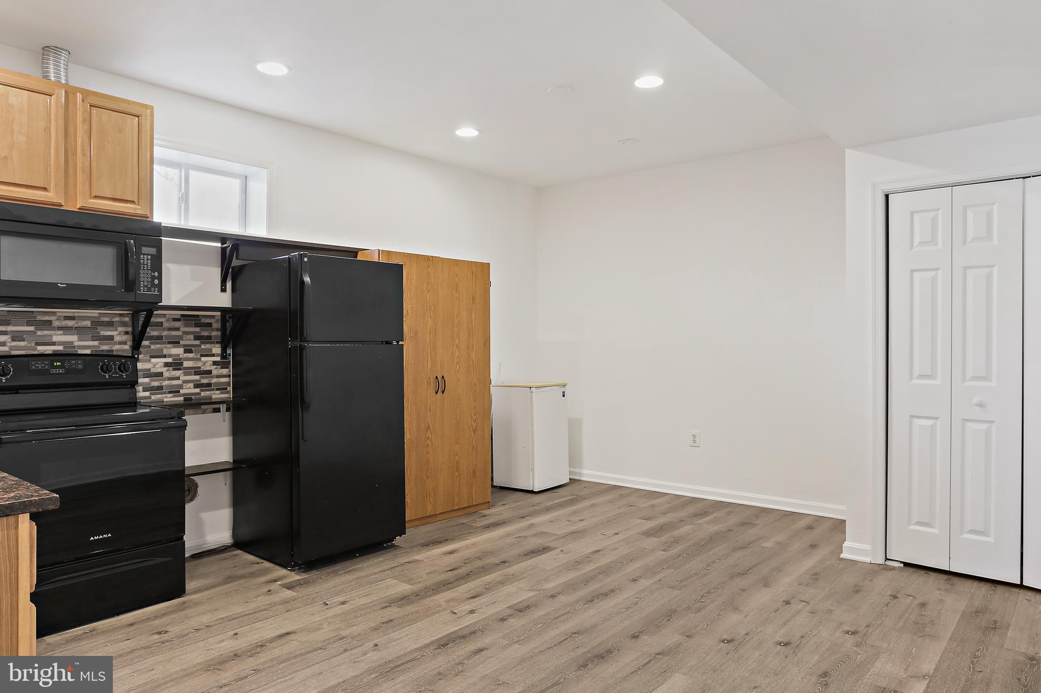 8680 Ridge Road Ellicott City, MD 21043 - Photo 26 of 43 Lower Level Kitchen with Breakfast Area
