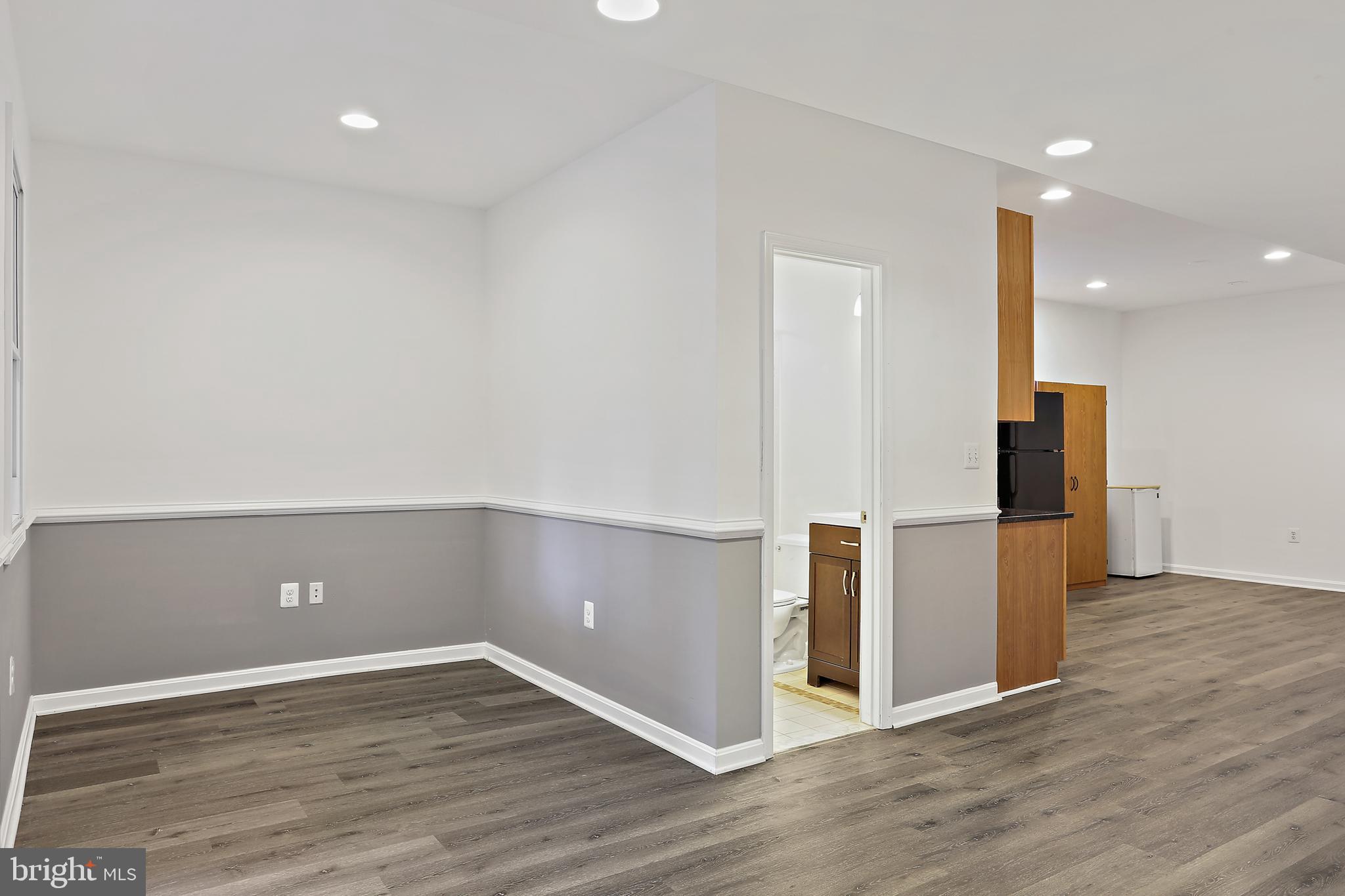 8680 Ridge Road Ellicott City, MD 21043 - Photo 27 of 43 Lower Level Dining Area with chair railing