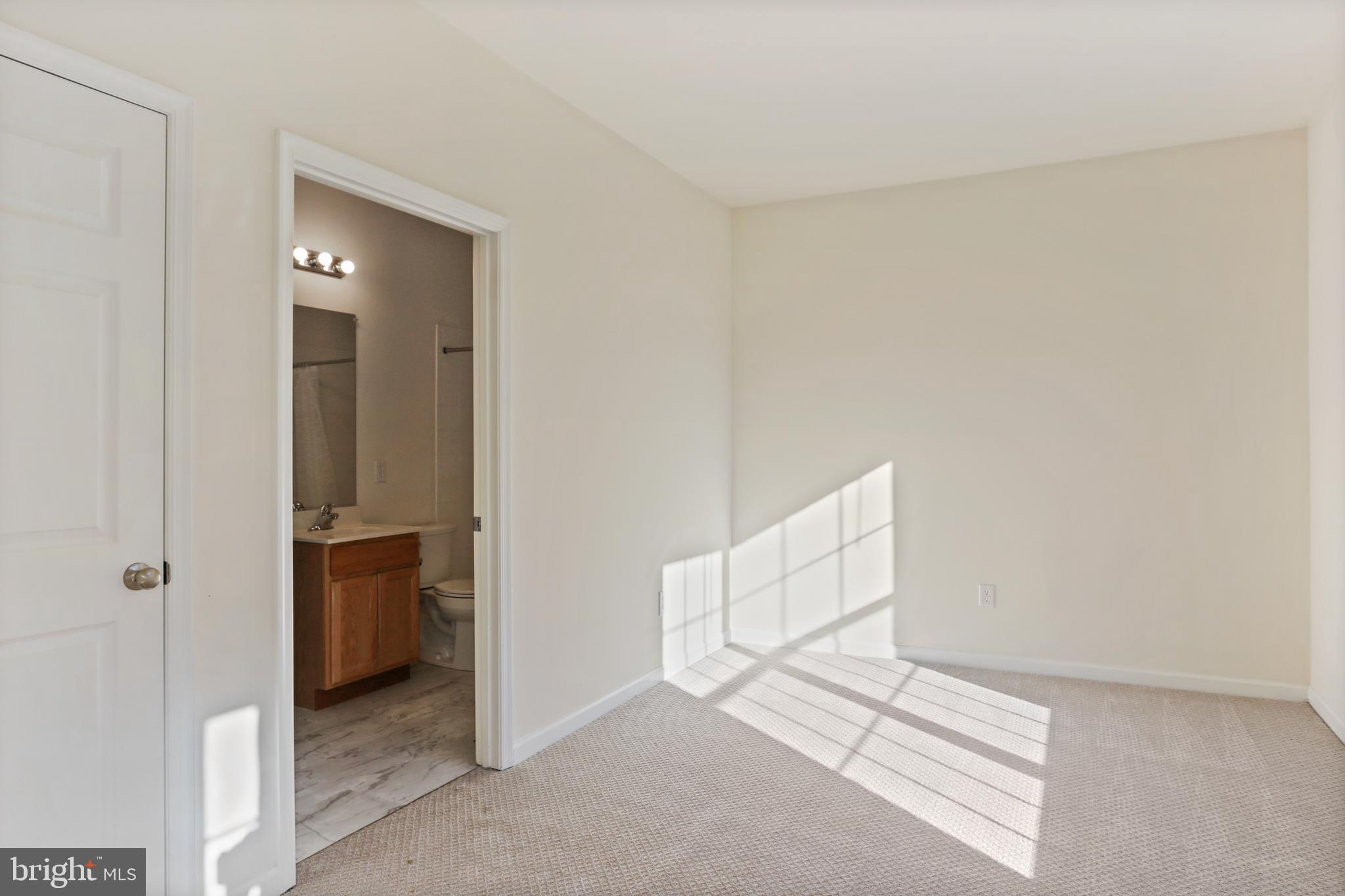 8680 Ridge Road Ellicott City, MD 21043 - Photo 5 of 43 Main Level Bedroom with attached Bath